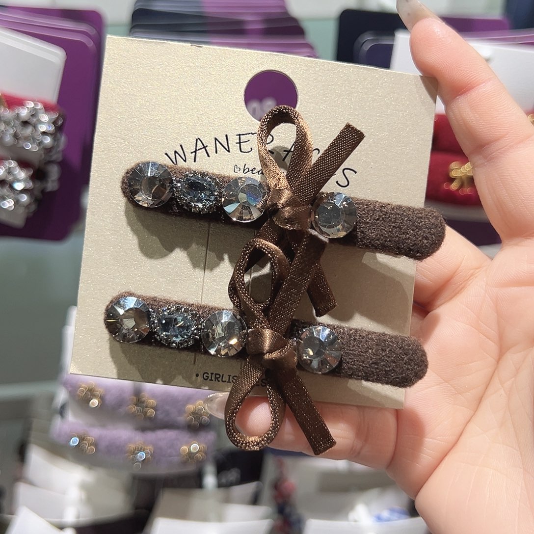 非金属咖色蝴蝶结鸭夹一对