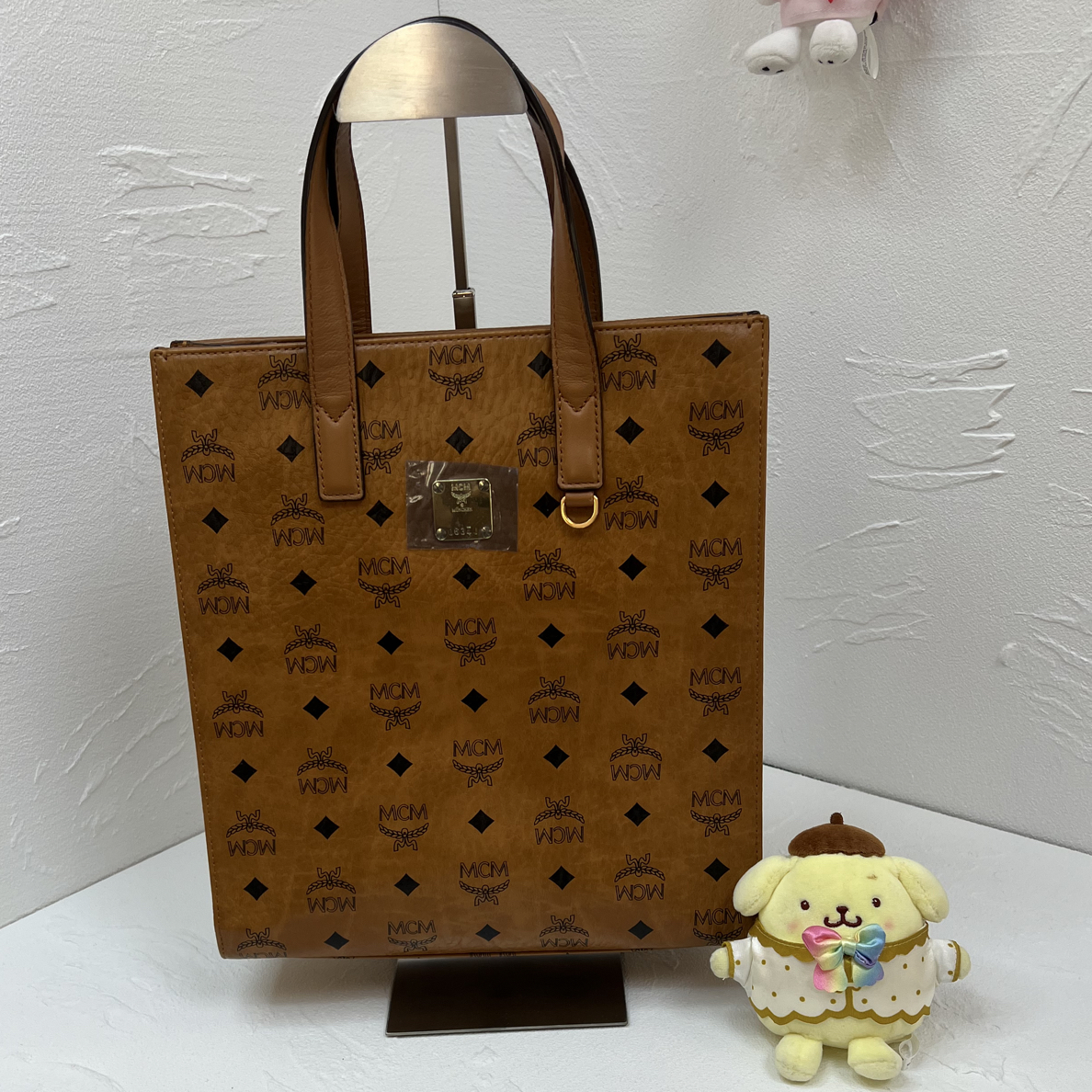 99新 MCM 方姐中古/ 干邑色 七格 琴谱 斜挎包大号 底长26