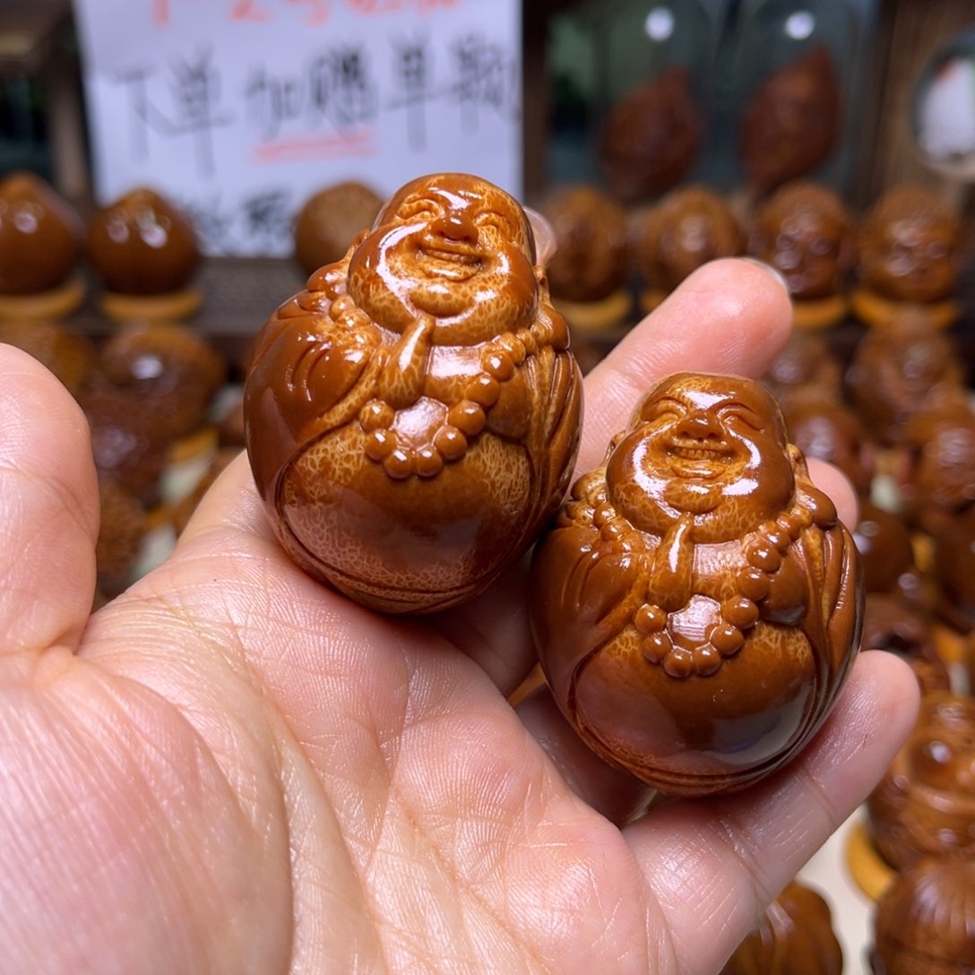 橄榄核把件孙*弥勒一对 三点九尺