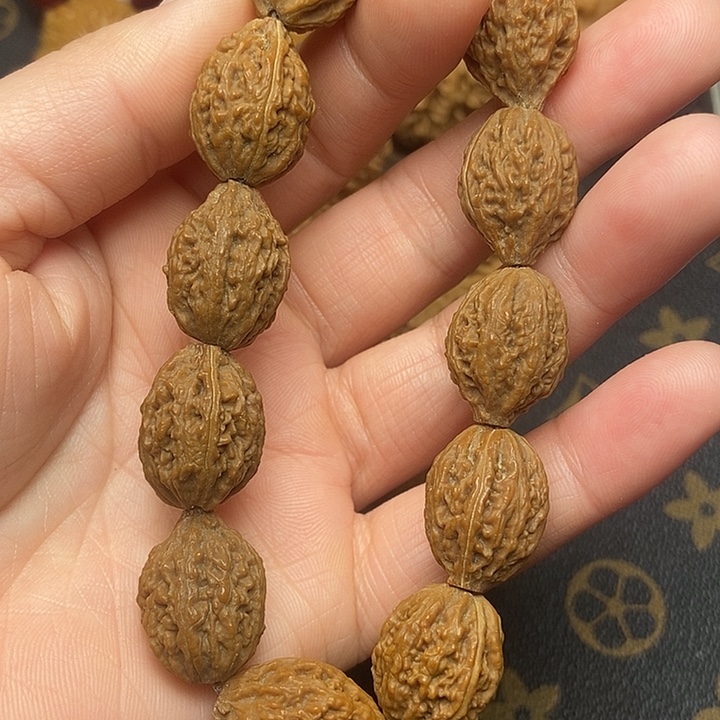 文玩核桃把件纯野生大秋子手串