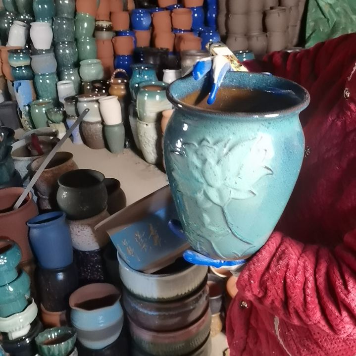 红陶口20高27瑕疵底裂