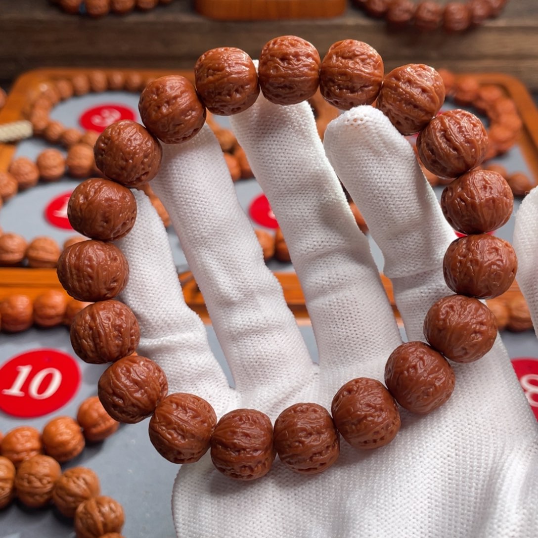 东***亮手串文玩核桃磨盘