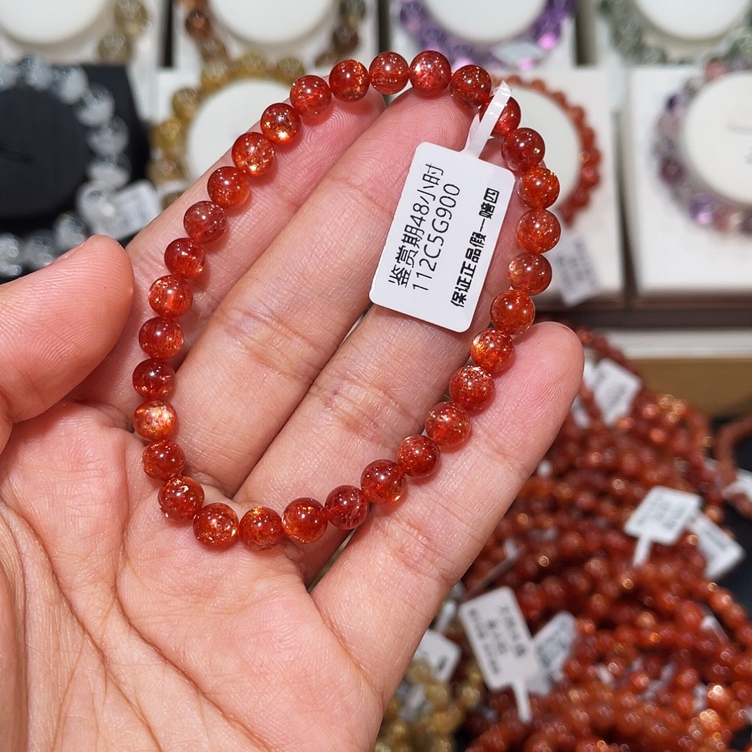 柒****长石手链未镶嵌毕业辣椒油红金太阳6.6mm