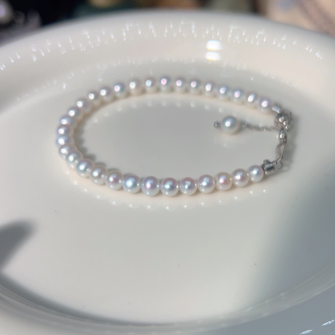 4到4.5极光镜面炫彩天然珍珠淡水珍珠钛钢