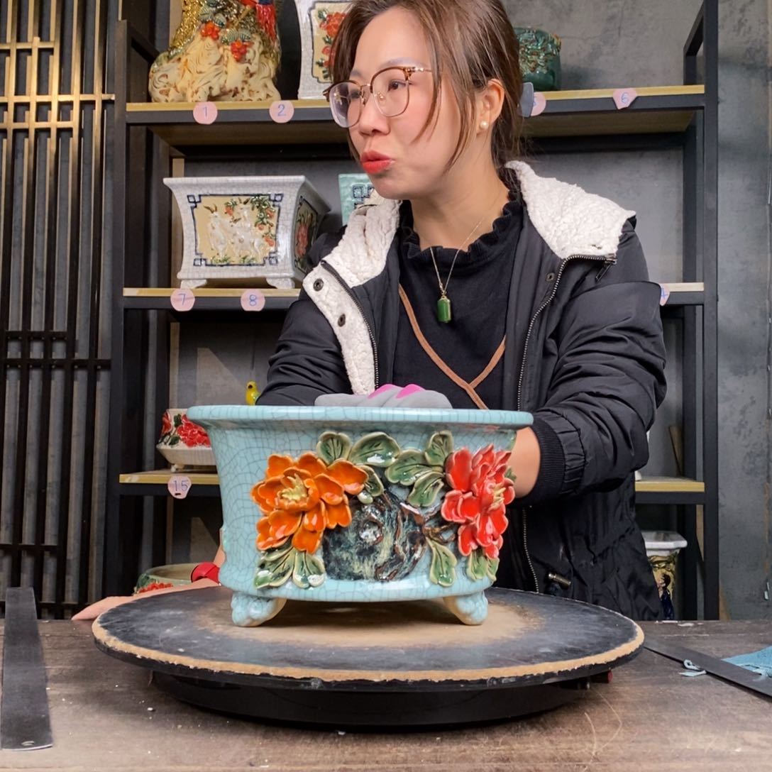 红陶志**学38豆青圆。    