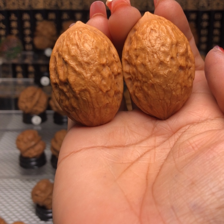 橄榄核吊坠小***?200乾坤指