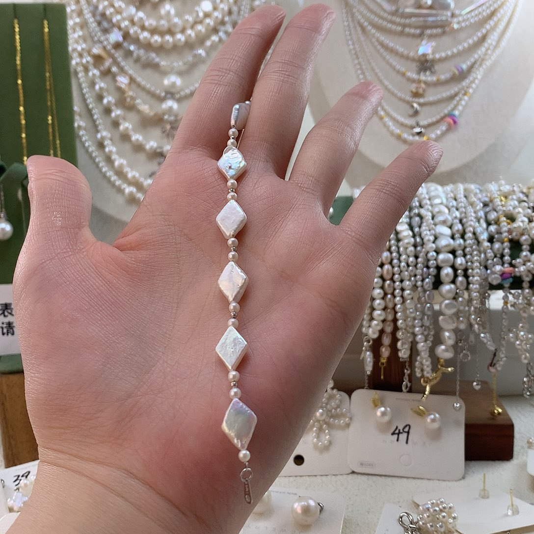 亦***菲淡水珍珠颈饰银S925镶嵌