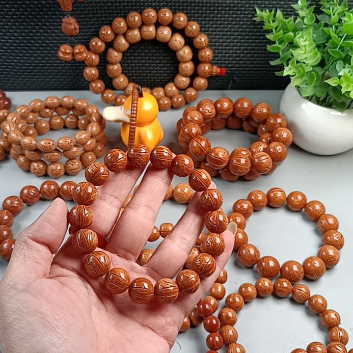 万****手串桃核铁籽密纹红魔13