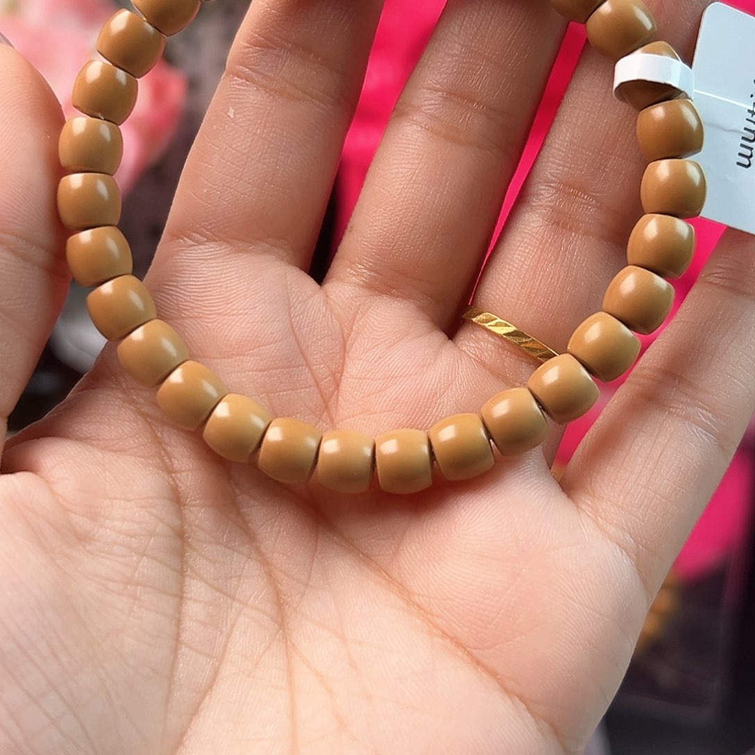 橄榄核手串老挝核尖直切单圈微微白74缩73