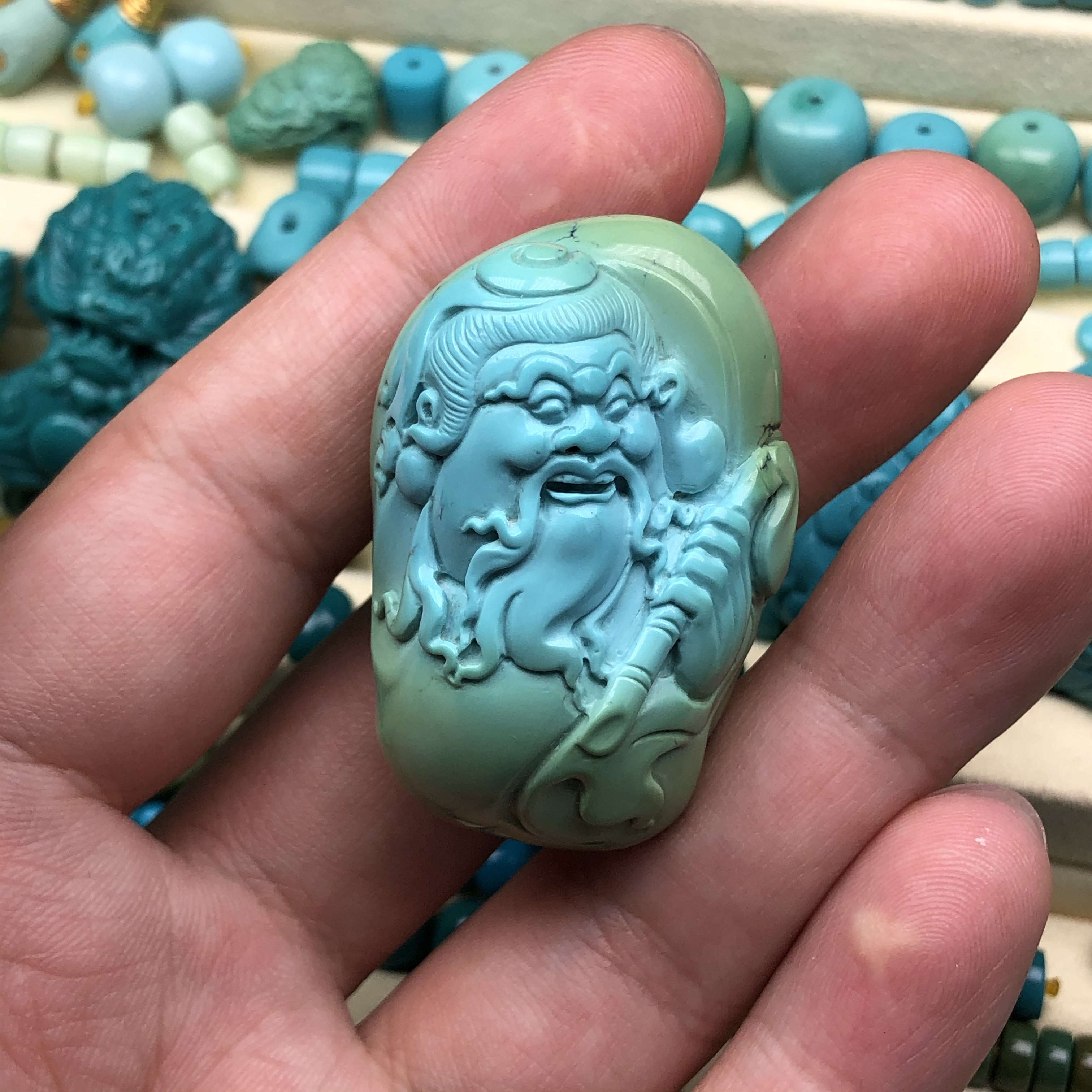 原矿高瓷绿松石三清道人      尺寸28*20*42    重33.8克