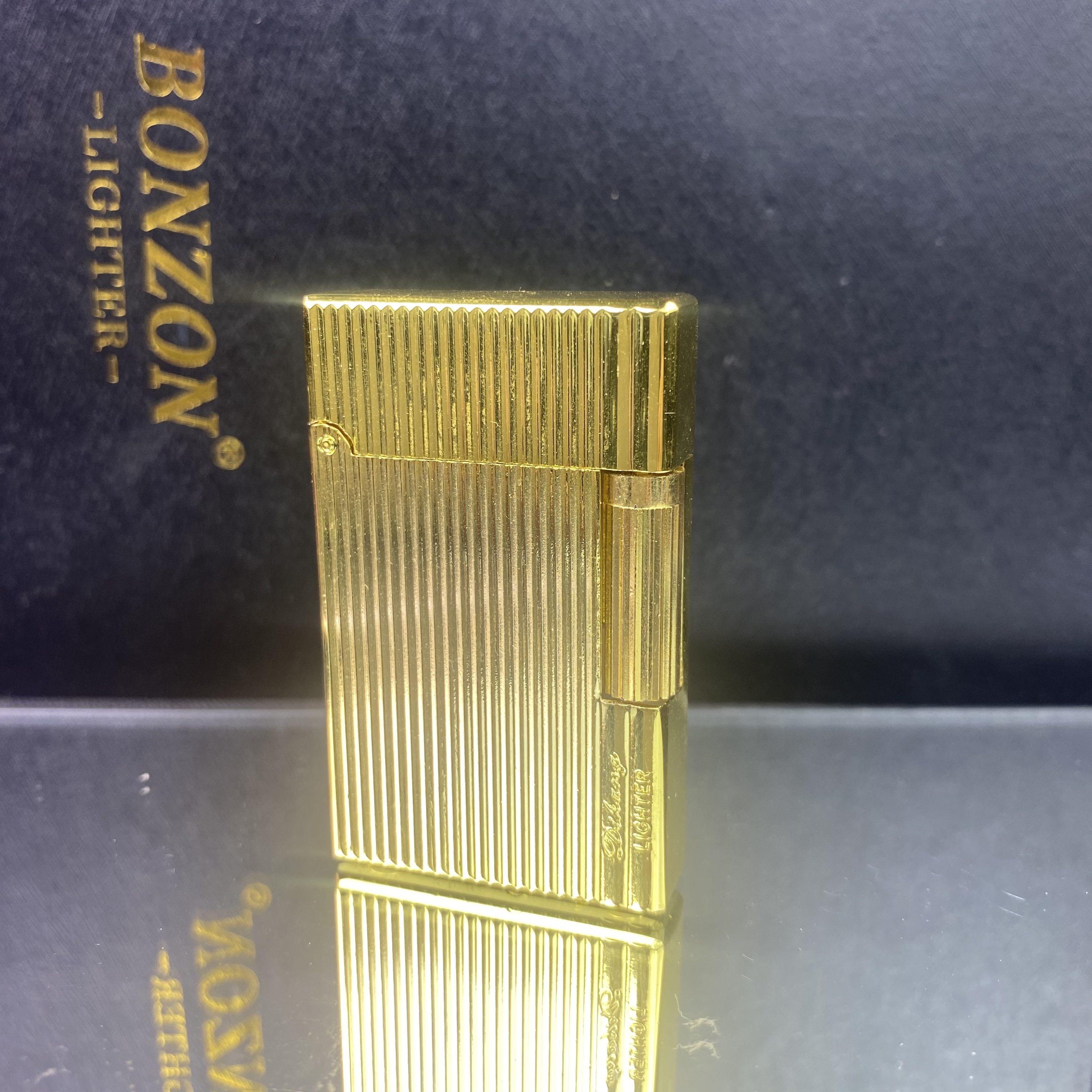 金竖纹高档朗声充气打火机金属砂轮侧滑钢音斜火明火男士打火机