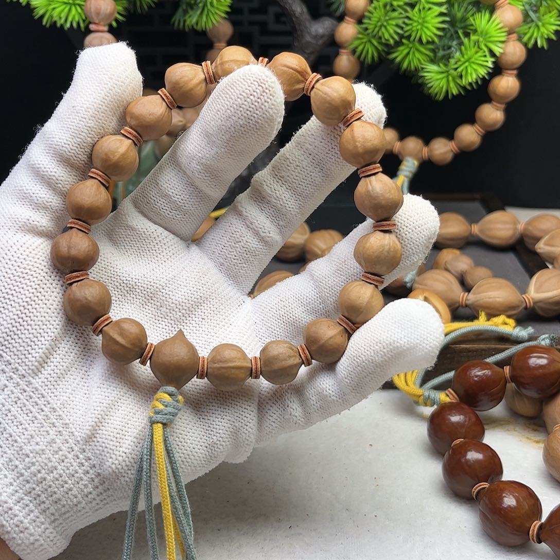 手串/手链橄榄核张***～1.3*1.3三花铁核