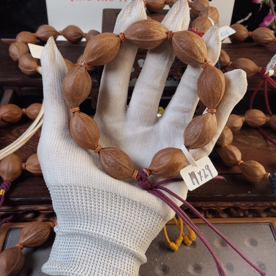 阿***智手串橄榄核原生态梅林铁核19*29