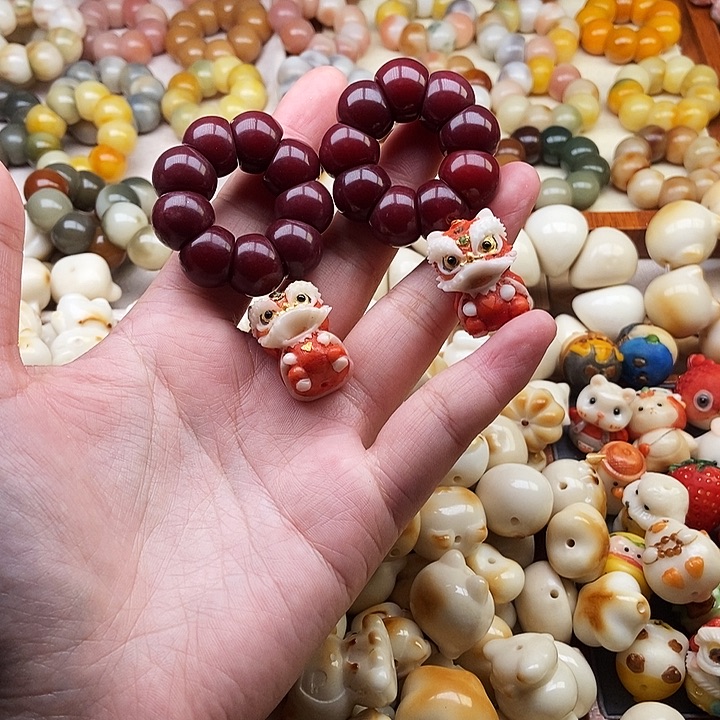 朱***ಣ吊坠菩提根/象牙果5