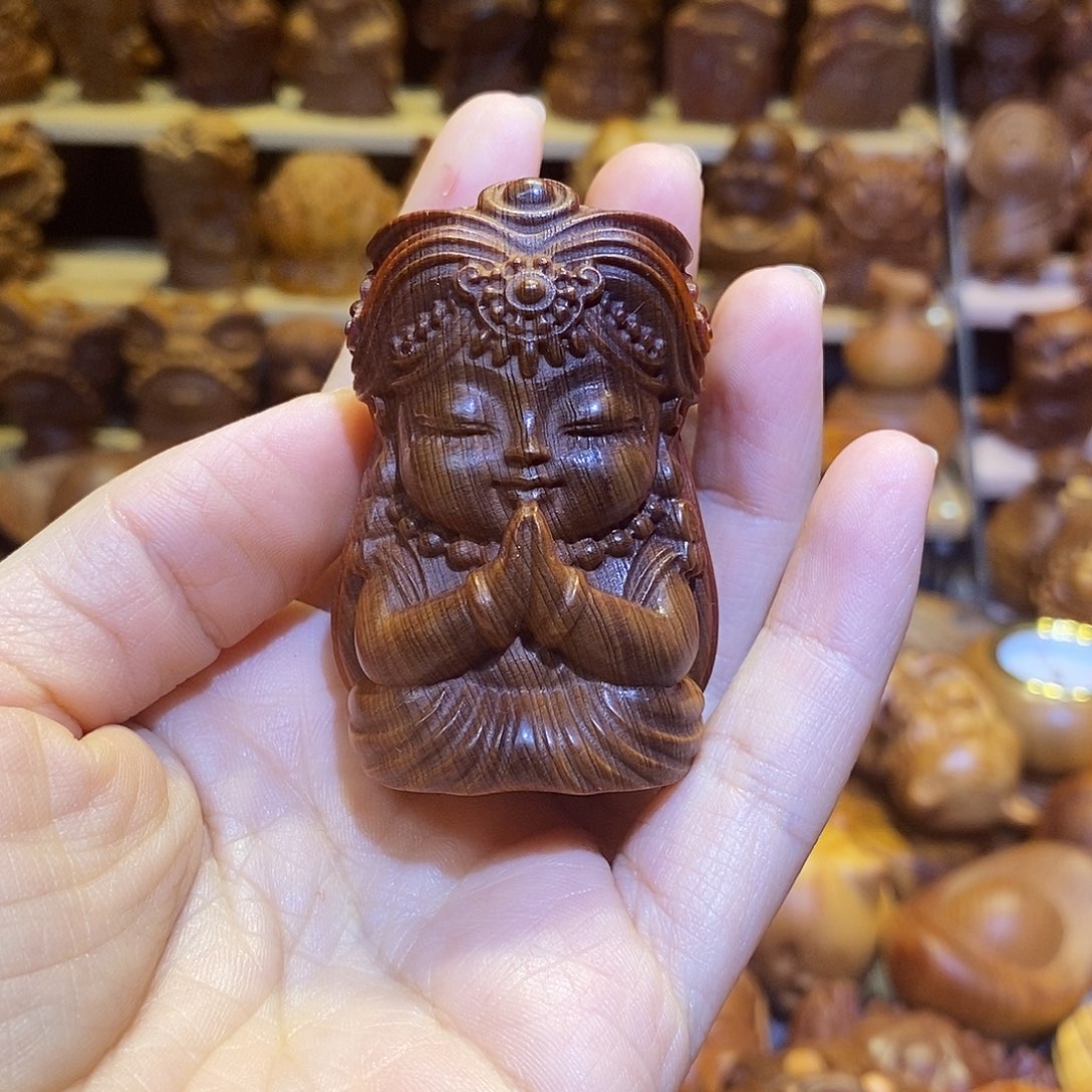 老***阔木崖柏木雕手把件