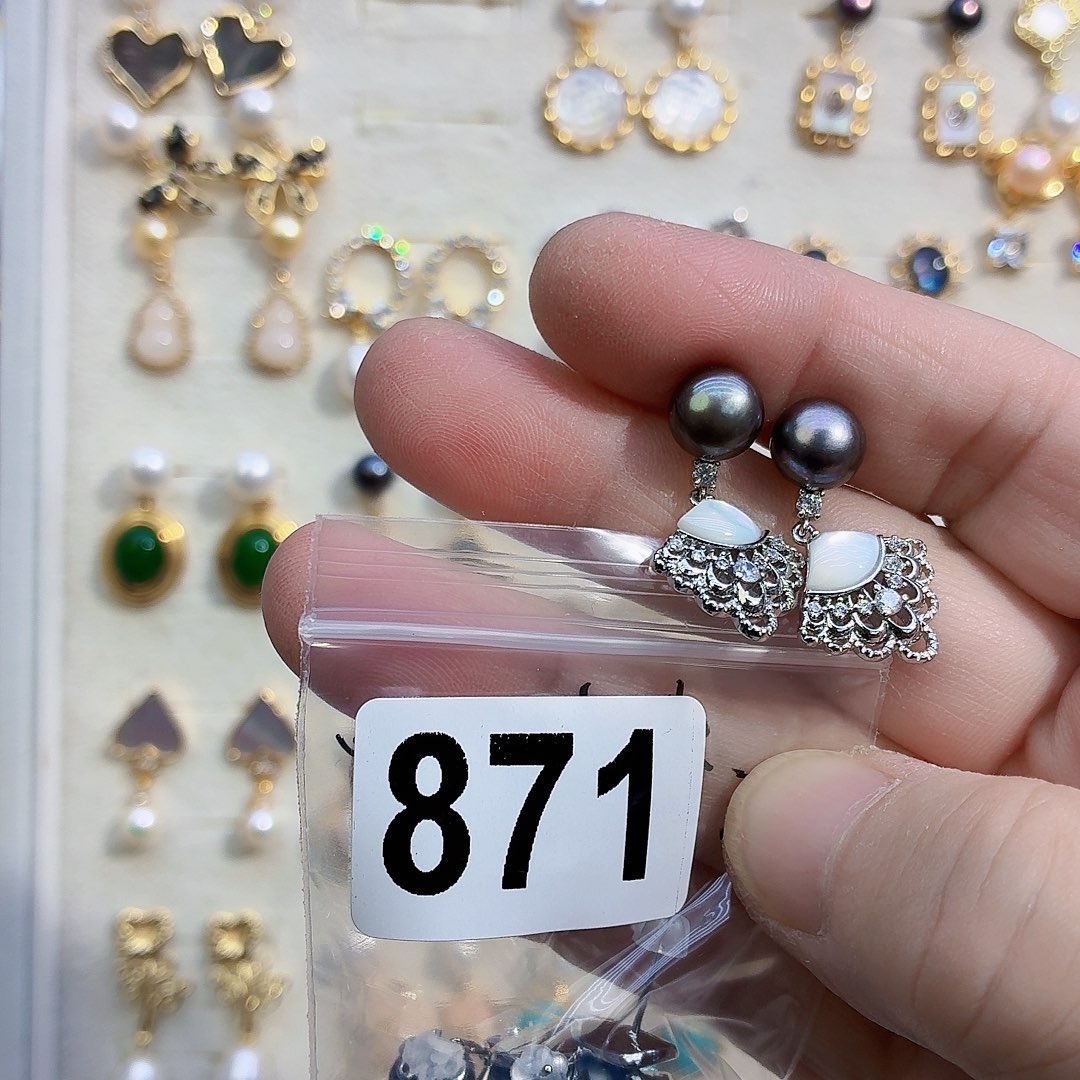 杏****淡水珍珠合金耳饰