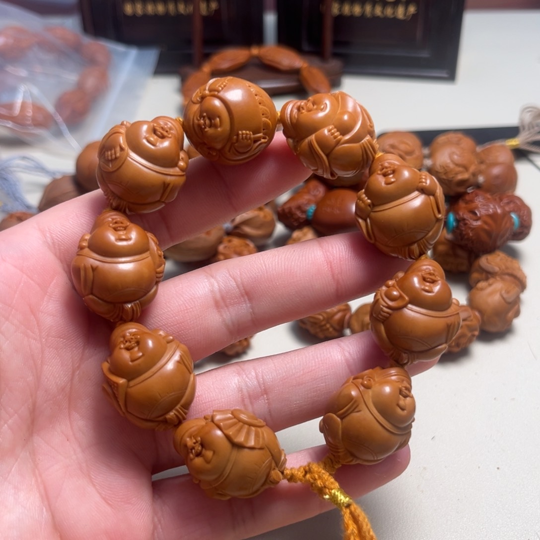 橄榄核吊坠研**造海派财神