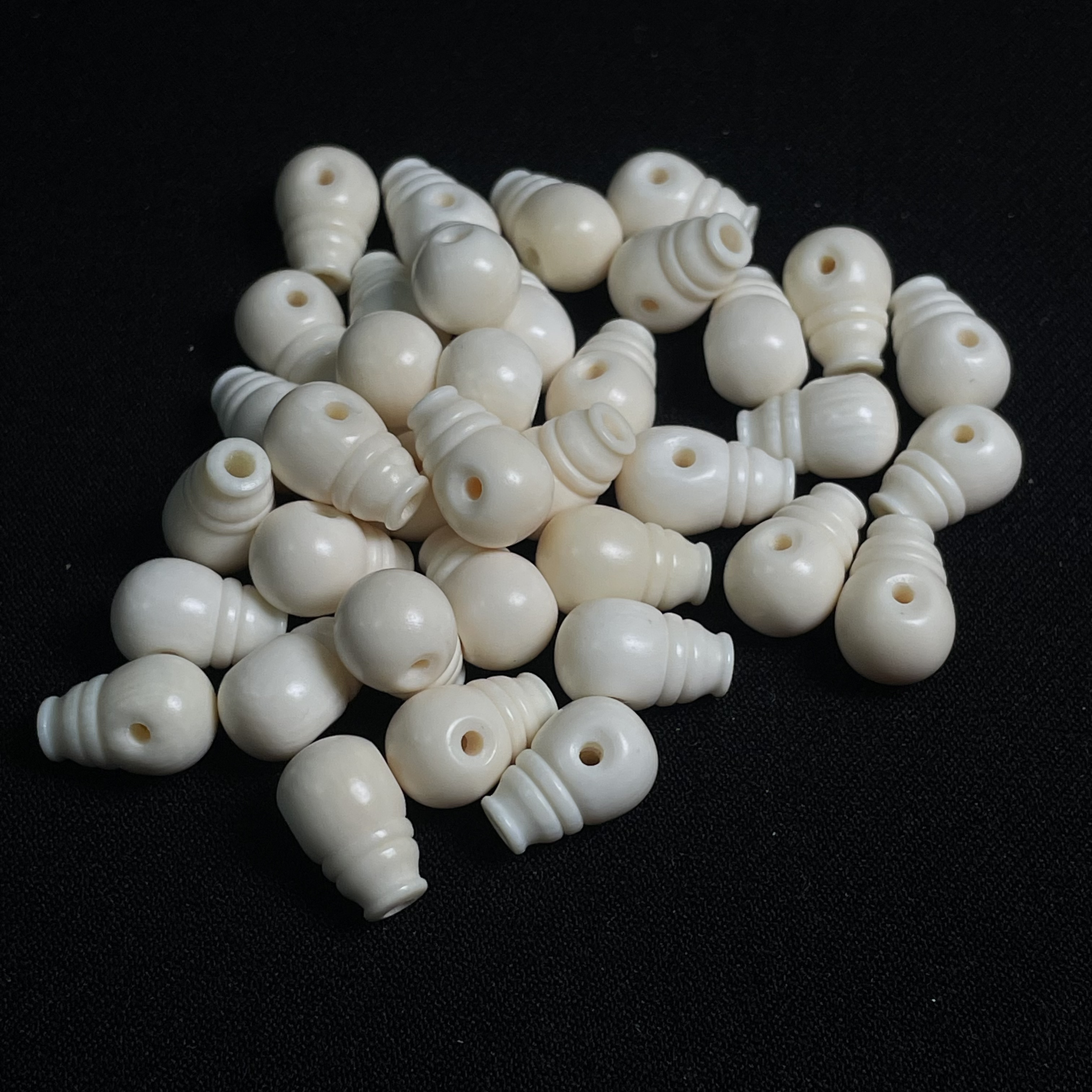 A037 一体奶嘴三通 只做天然猛犸牙 对孔约8*13mm