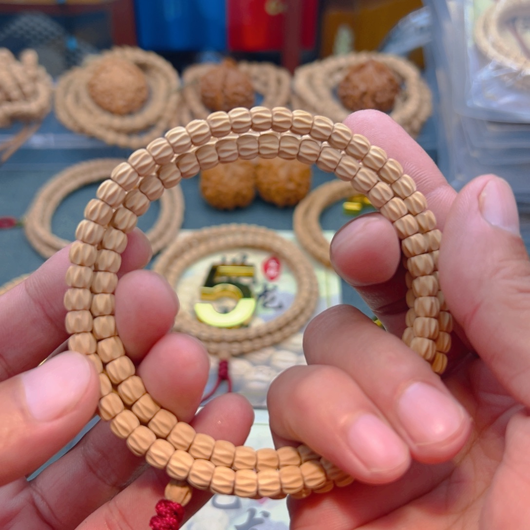 佰***万柏香籽/百香籽吊坠