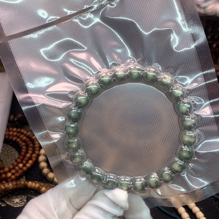 吊坠星月菩提10×9绿包白大眼睛