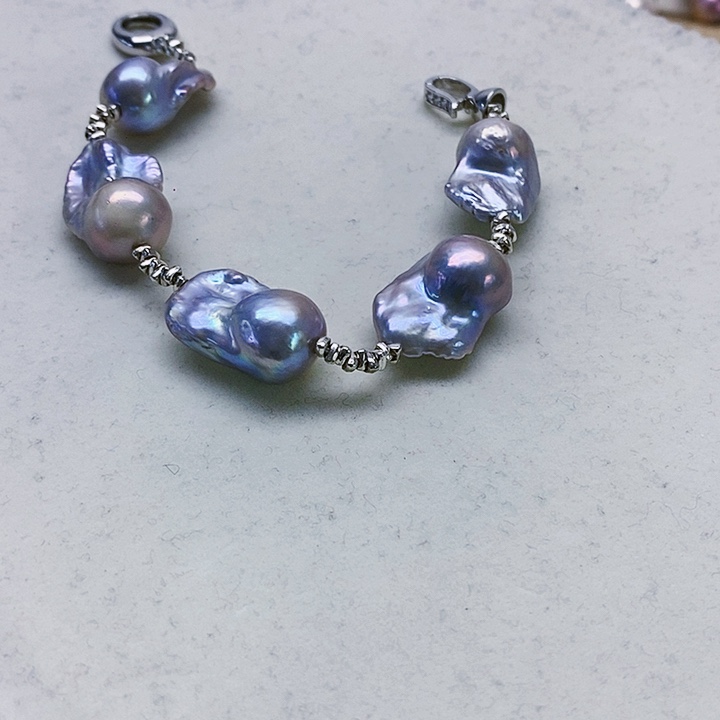 银S925镶嵌耳饰淡水珍珠吨**吨