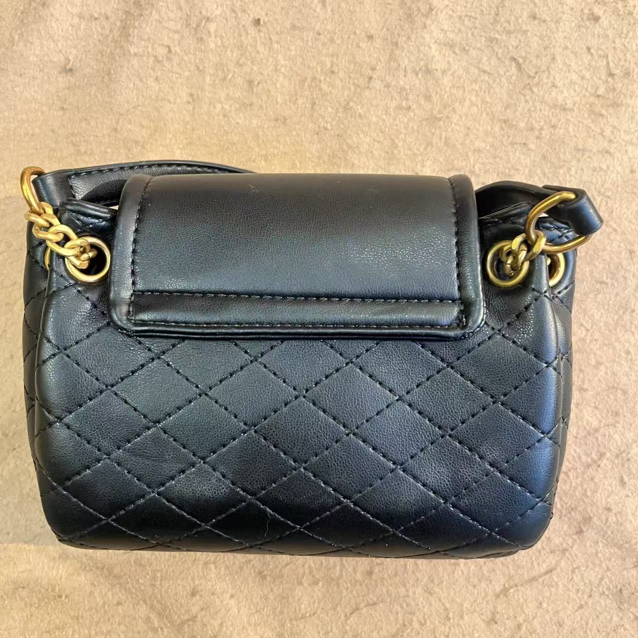 TOLEX2025新款手工时尚女包塔黑色百搭