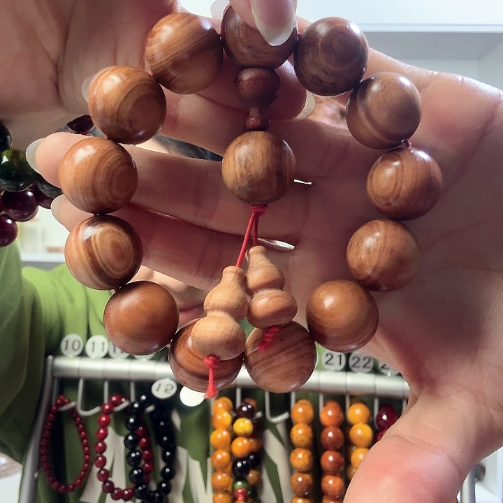 松木原生态琥珀木手串1.8猫眼男款