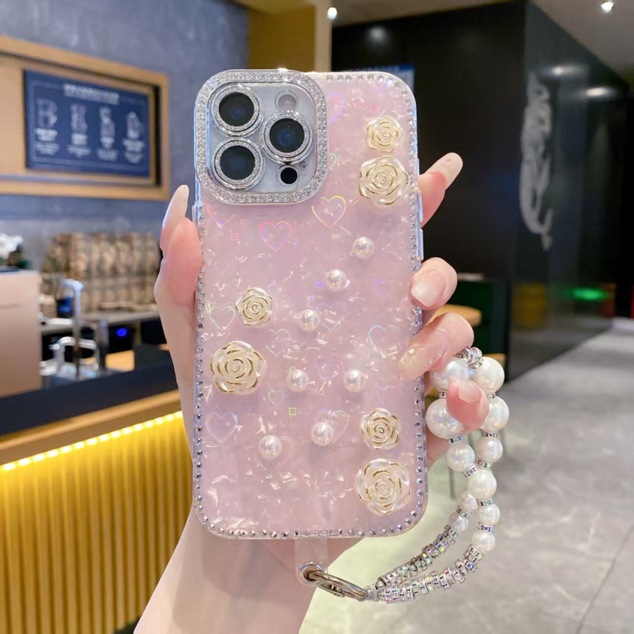 山茶花珍珠闪钻边框适用于苹果17ProMax/16/15/14/13手机壳