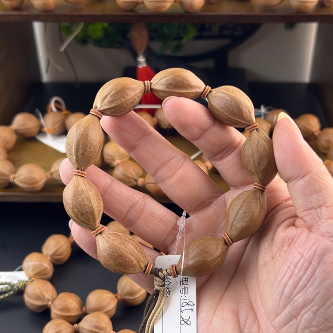 橄榄核吊坠梅林铁核老树核素串18.528