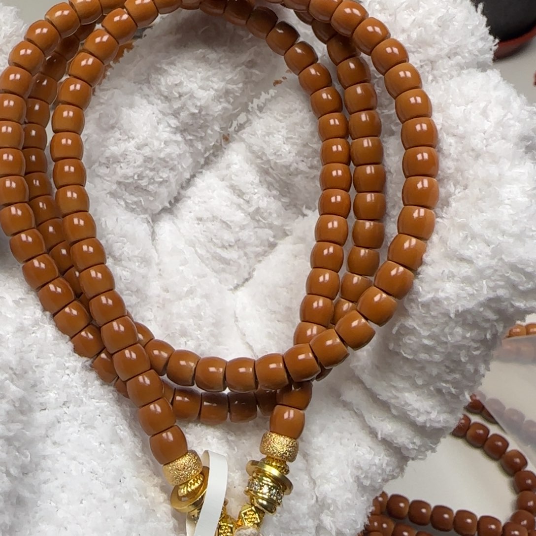 手串橄榄核老挝长串直切三花无白5.7mm