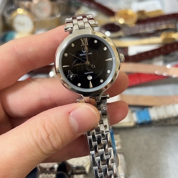 徐***.钢牛皮（革）钢石英机芯