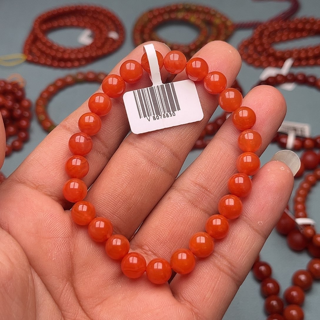 胡***图南红玛瑙未镶嵌手链樱桃红卡7+