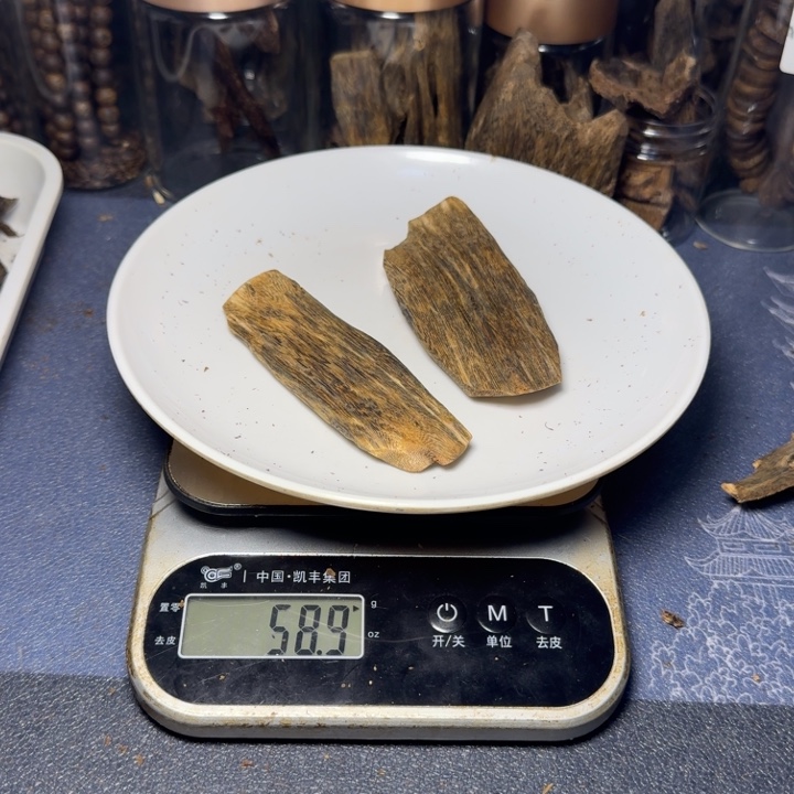 木朝*吼海南黑棋手把件58克