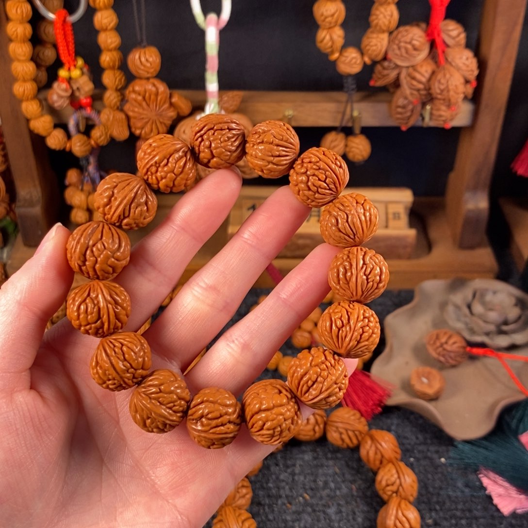 吊坠桃核桃枭手串