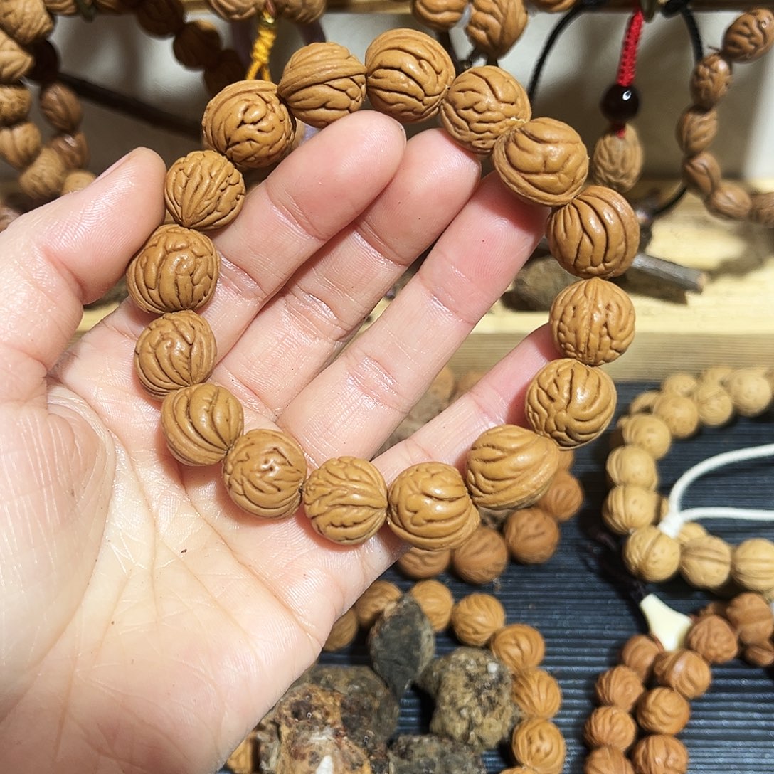 野生桃桃枭手串精品