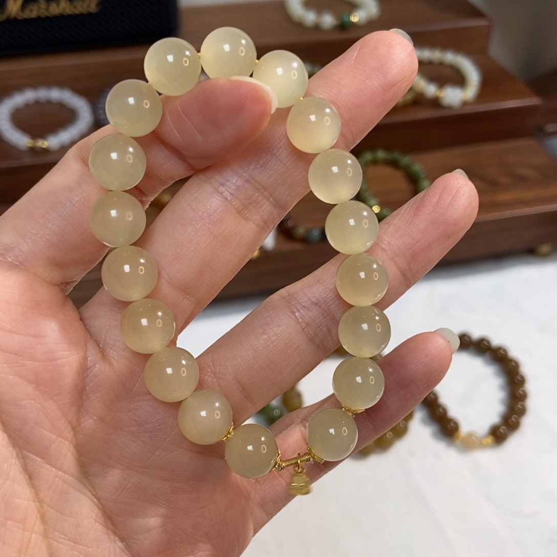 拒***思和田玉18K金镶嵌手链蜂蜜水10mm高冰底猫精品