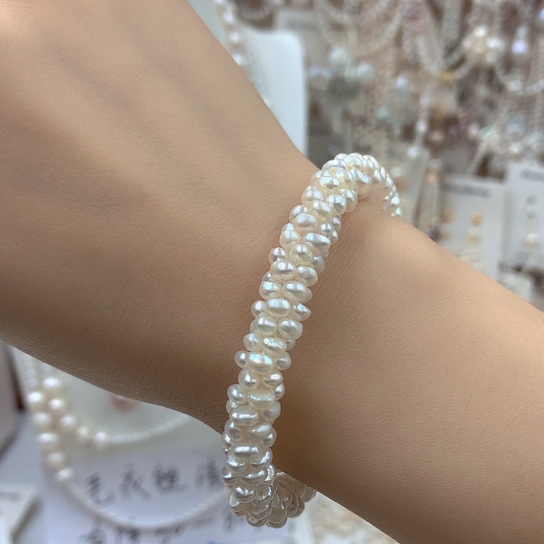 淡水珍珠银S925镶嵌耳饰