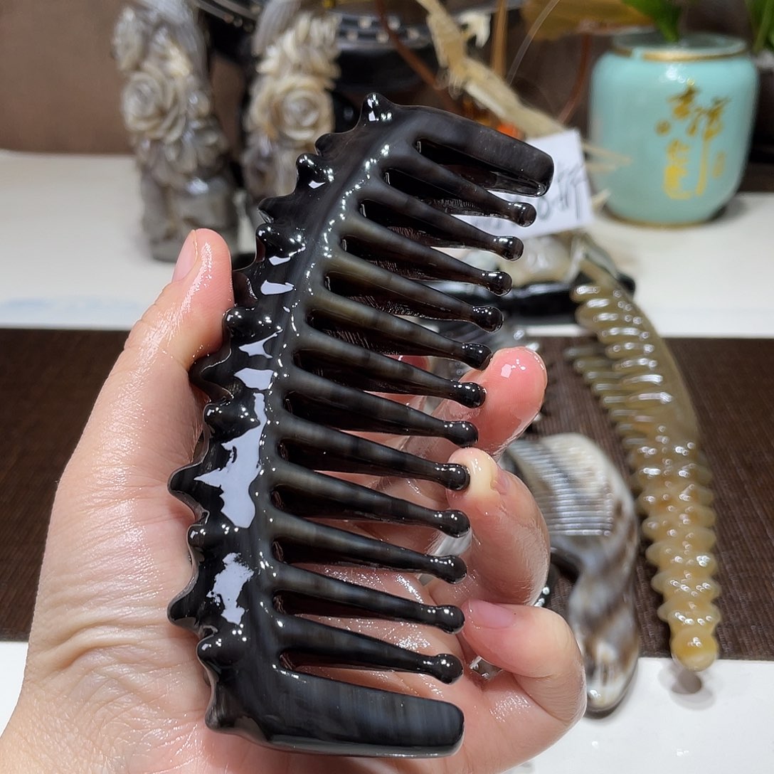 折后价 黑金刚海参水滴梳