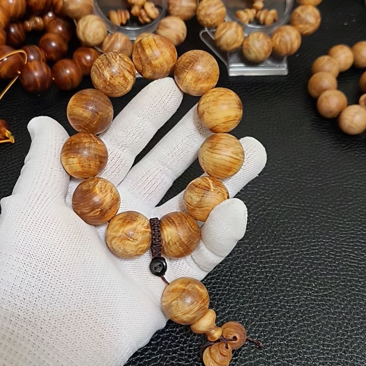 雪***厨非洲檀香无事牌琥珀木手串