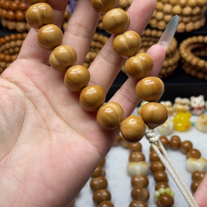 鲁***黔猴头核桃手串微瑕屁桃