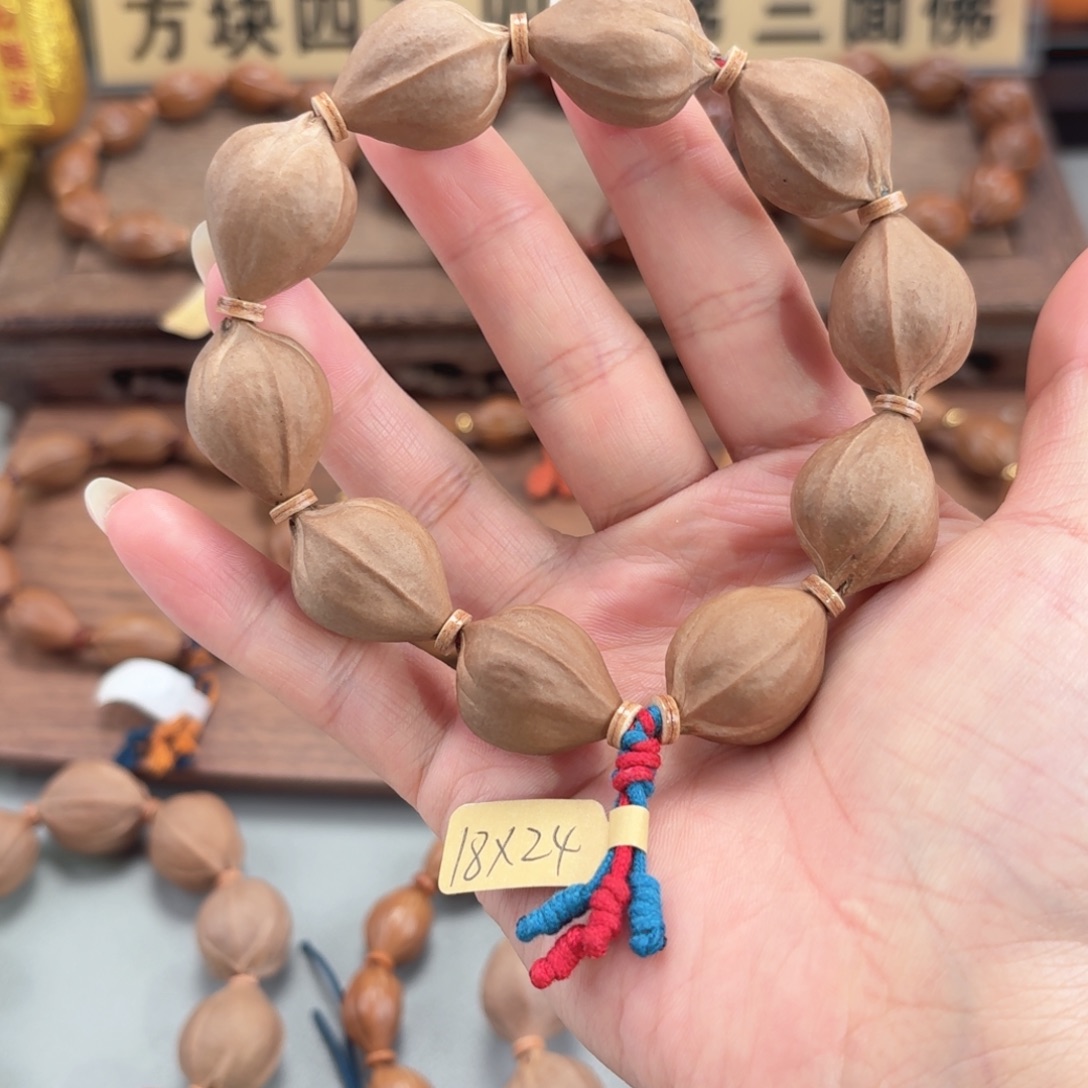 防***门手串橄榄核三面佛