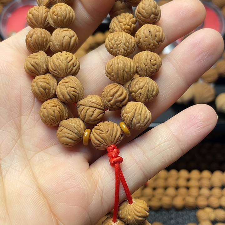 是***吖把件桃核小金豆手持12尺寸30颗