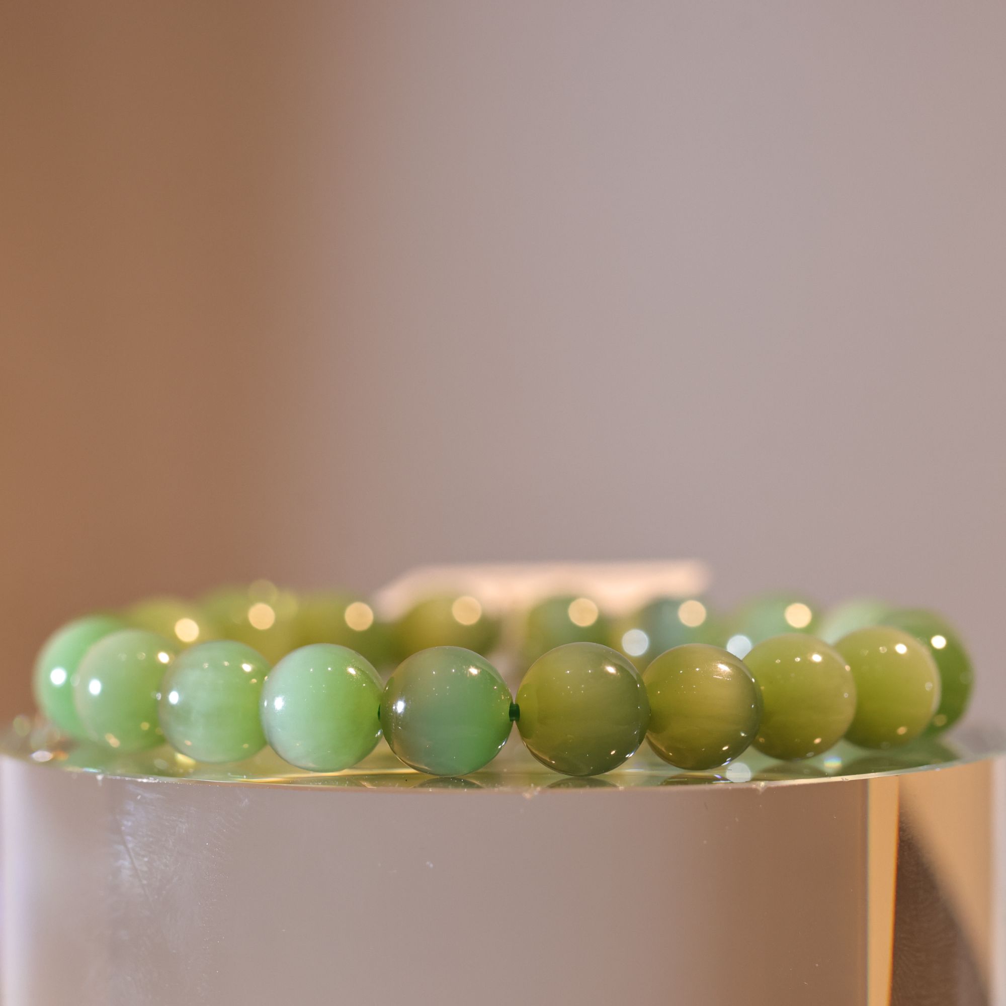 【新疆马爷珠宝】粉绿猫眼手串 卡9.5