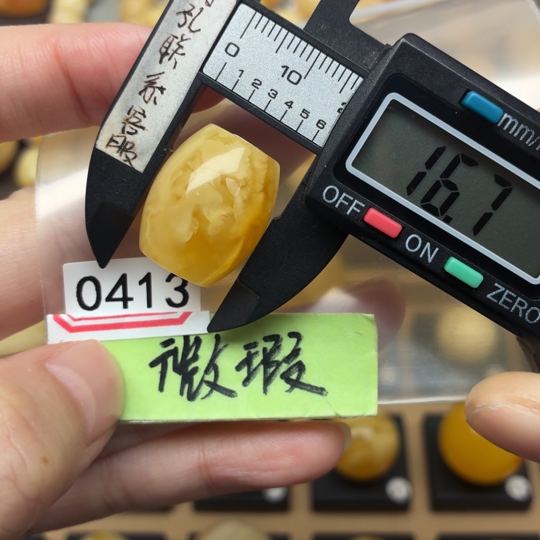 琥珀未镶嵌裸石蜜蜡虎皮溶洞意境带荧光39克价