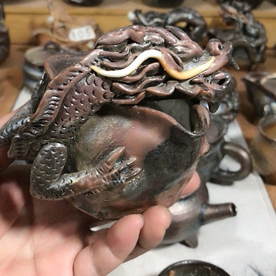 瓷片微瑕的龙公道