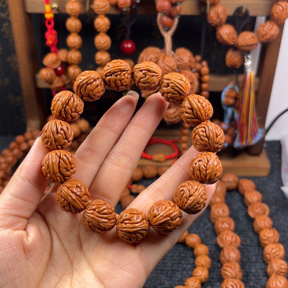 用***6吊坠桃核桃枭手串L2