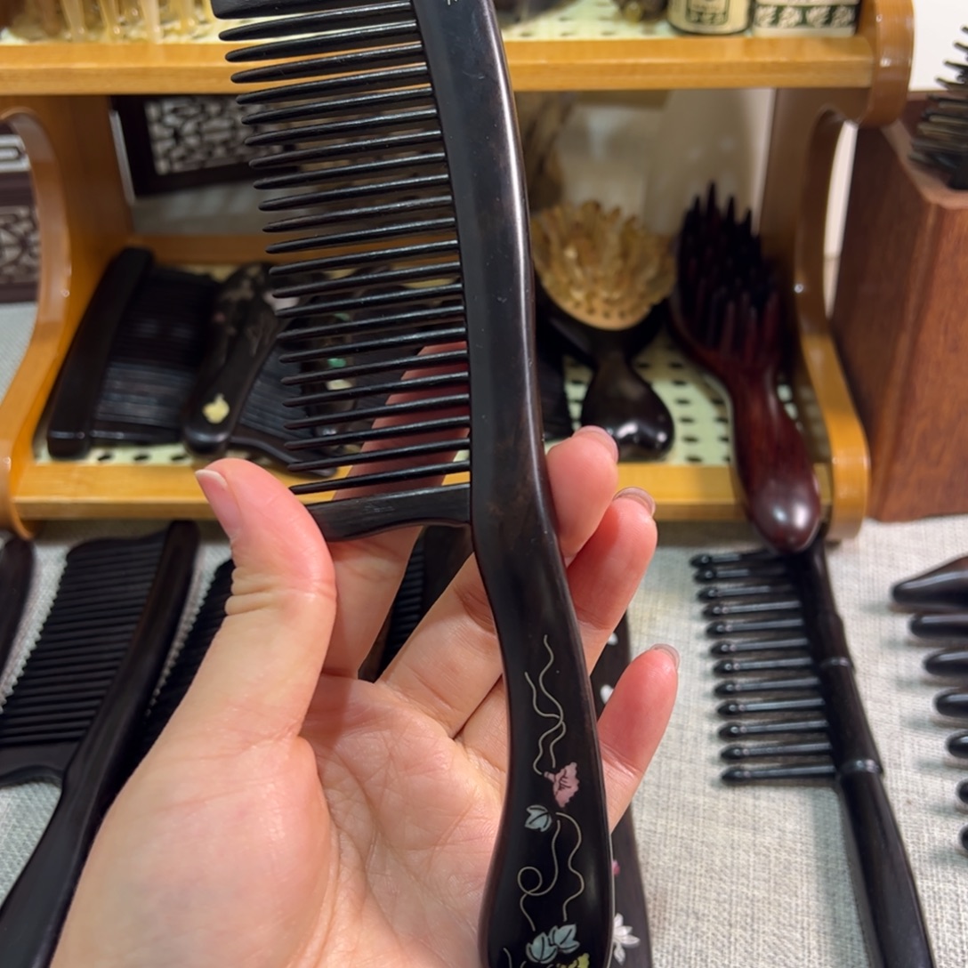 紫光檀插齿梳子新品
