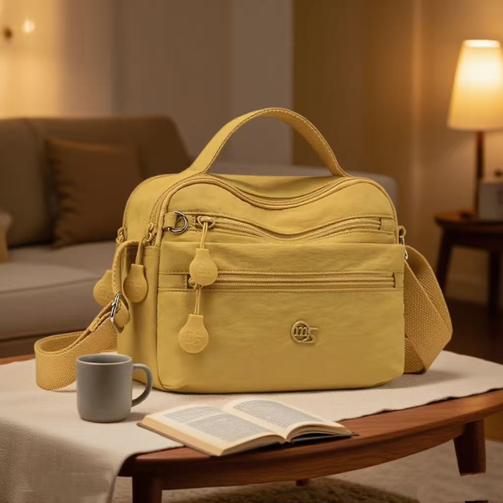 包包女爆款2025新款多隔层休闲包单肩斜挎包纯色百搭防泼水通勤包