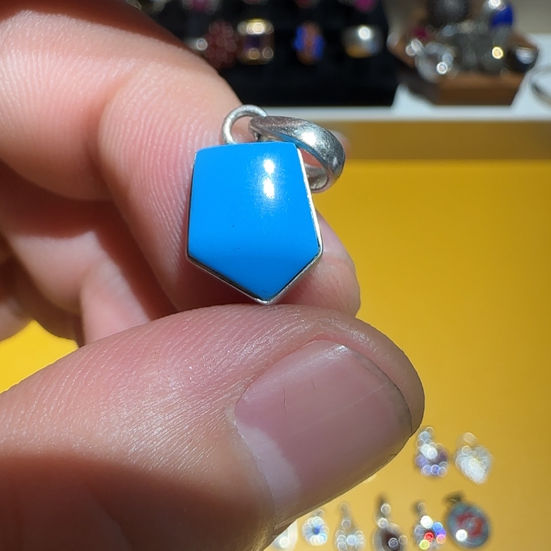 金***3大理石纯铜吊坠的设计也是非常