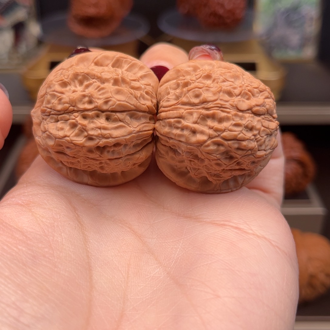 桃核把件平谷血麒麟野生